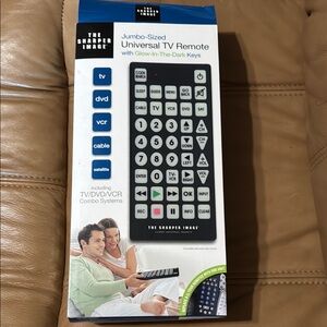 NWT Sharper Image Jumbo Remote with Glow Keys. Up to 8 devices